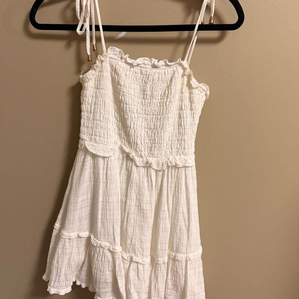 White ruffle mini dress